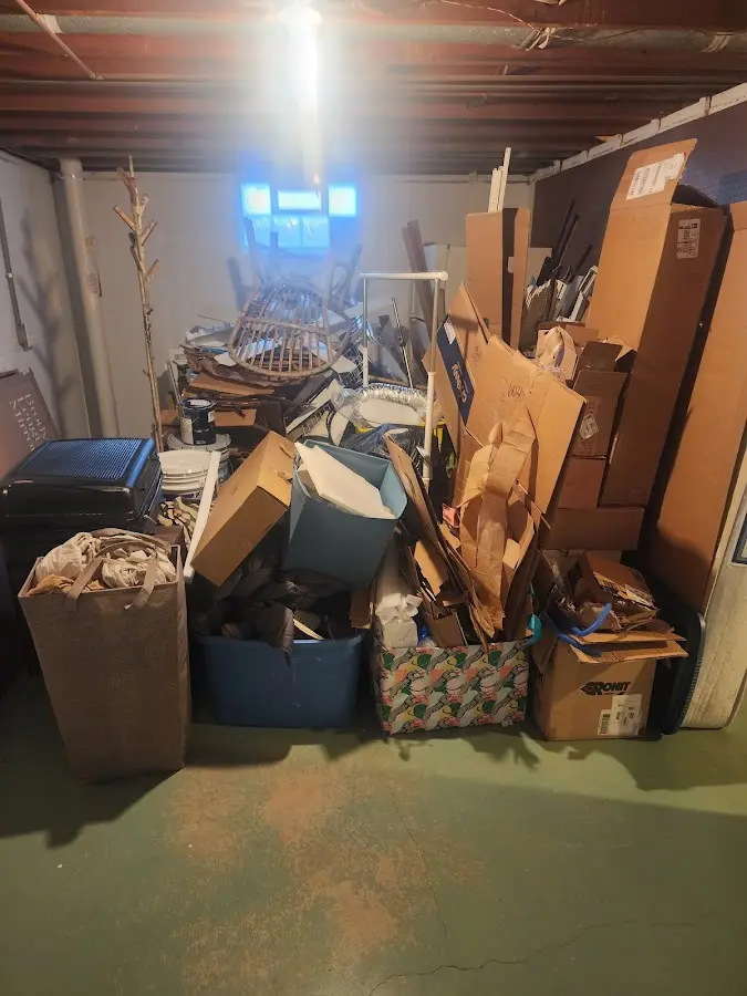 Roll-off dumpster container at job site for Concrete Dumpster Rental in Jackson